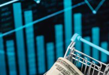 How Cryptocurrency Could Transform Small-Town Life Image of cash and physical bitcoins in a tiny shopping cart